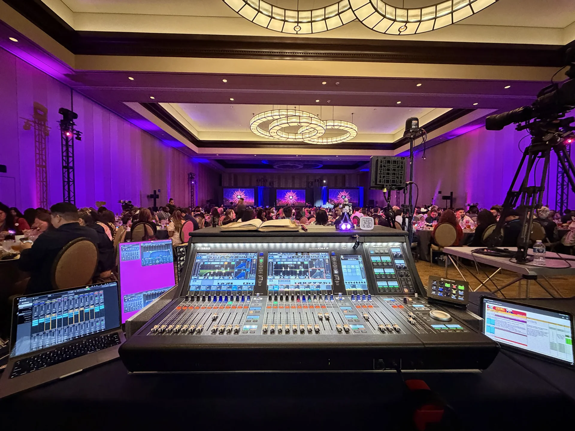 Professional audio production console and sound engineering setup supporting a live corporate conference session at the National AIDS Latinx Conference (NALA).